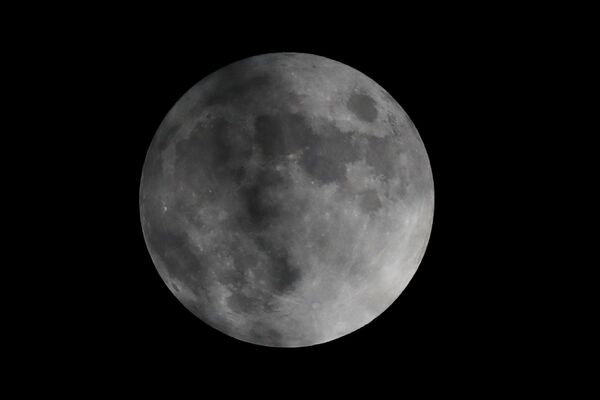 Полная луна во время полутеневого затмения над Мексикой  - Sputnik Узбекистан