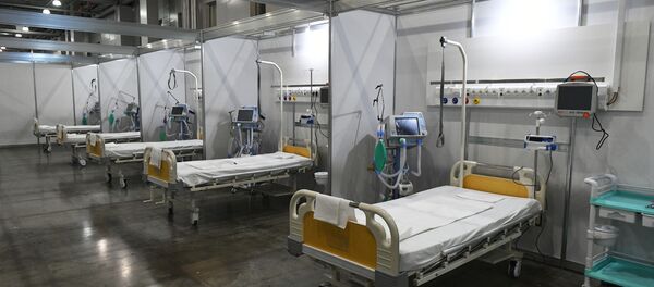 Палаты во временном госпитале для пациентов с COVID-19 Палаты во временном госпитале для пациентов с COVID-19 - Sputnik Ўзбекистон