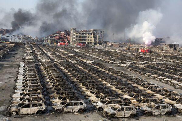 Последствия взрыва в городе Тяньцзинь. Китай - Sputnik Узбекистан