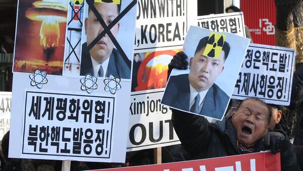 Протест против объявления Северной Кореи об испытаниях водородной бомбы - Sputnik Узбекистан