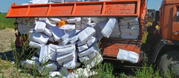 Уничтожение санкционной продукции в России Уничтожение санкционной продукции в России - Sputnik Узбекистан