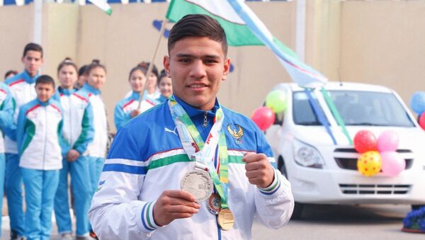 Узбекский боксер Муроджон Ахмадалие - Sputnik Узбекистан