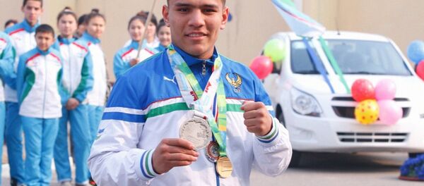 Узбекский боксер Муроджон Ахмадалие - Sputnik Узбекистан