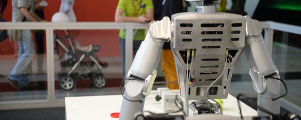 Робот, представленный на выставочном стенде Робот, представленный на выставочном стенде - Sputnik Узбекистан