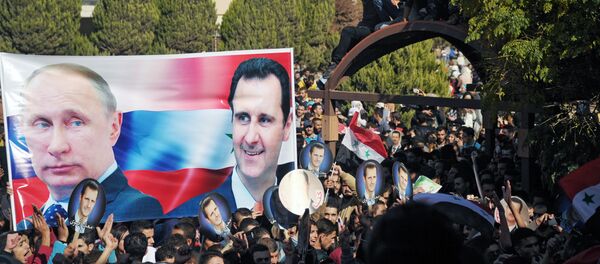 Митинг студентов университета Баас в поддержку действий российской авиации в Сирии Митинг студентов университета Баас в поддержку действий российской авиации в Сирии - Sputnik Узбекистан