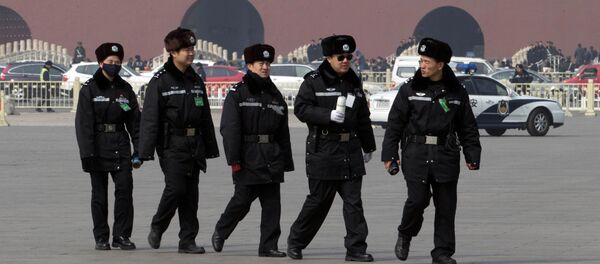Китайская полиция Китайская полиция - Sputnik Ўзбекистон