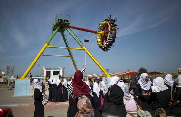 Жительницы сектора Газа принимают участие в празднованиях, организованных ООН по случаю Международного женского дня - Sputnik Узбекистан