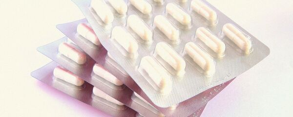 Медицинский препарат в капсулах - Sputnik Узбекистан