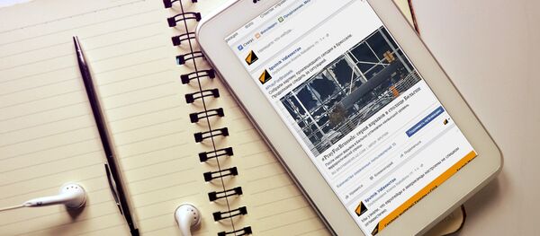 Планшет с открытым в интернете сайтом - Sputnik Ўзбекистон