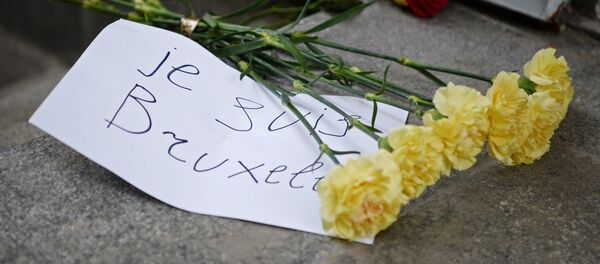 Акция в память о погибших при взрывах в Брюсселе у посольства Бельгии в Москве - Sputnik Узбекистан