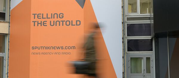 Логотип международного информационного бренда Sputnik - Sputnik Узбекистан