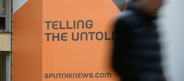 Логотип международного информационного бренда Sputnik - Sputnik Узбекистан