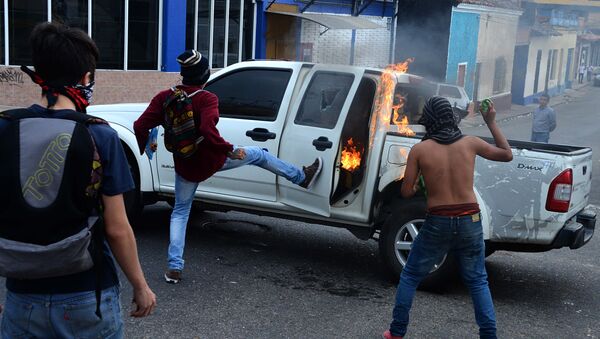 Протесты населения в Венесуэле - Sputnik Узбекистан