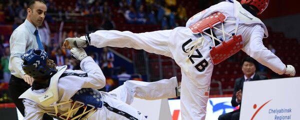 Соревнования среди мужчин по тхэквондо Соревнования среди мужчин по тхэквондо - Sputnik Узбекистан