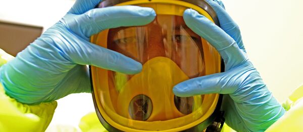 Защитный костюм от химических и бактериологических воздействий - Sputnik Узбекистан