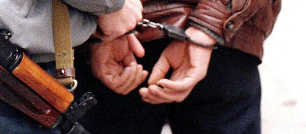 Қўлга олинган жиноятчи Қўлга олинган жиноятчи - Sputnik Ўзбекистон