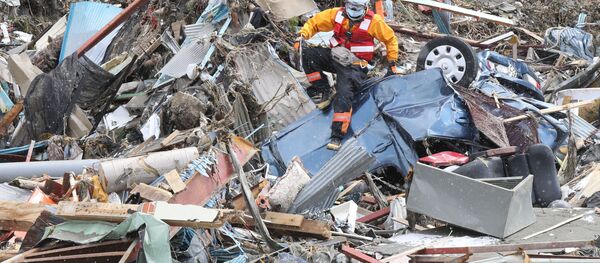 Последствия землетрясения в Японии Последствия землетрясения в Японии - Sputnik Узбекистан