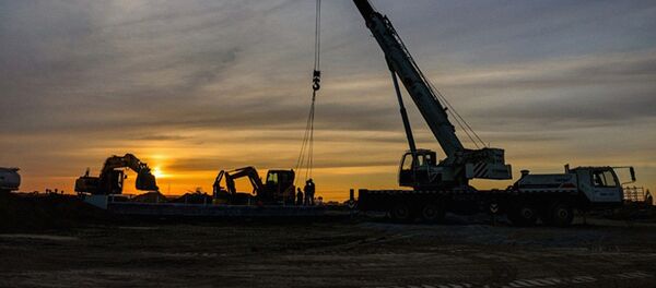 Фоторепортаж с места строительства Кандымского ГПК Фоторепортаж с места строительства Кандымского ГПК - Sputnik Узбекистан