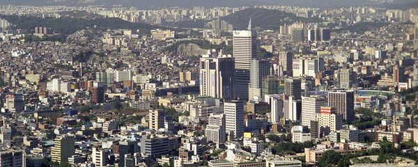 Вид на город Сеул с горы Намсан Вид на город Сеул с горы Намсан - Sputnik Ўзбекистон