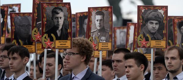 Участники Бессмертного полка Казанского университета Участники Бессмертного полка Казанского университета - Sputnik Узбекистан