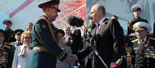 Президент России Владимир Путин и министр обороны РФ Сергей Шойгу Президент России Владимир Путин и министр обороны РФ Сергей Шойгу - Sputnik Узбекистан