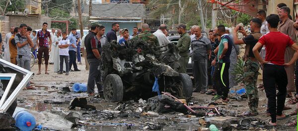 Последствия теракта в Багдаде Последствия теракта в Багдаде - Sputnik Узбекистан