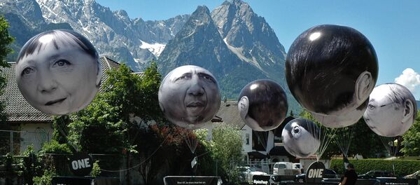 G-7 га аъзо мамлакатлар раҳбарлари қиёфалари акс эттирилган шарлар G-7 га аъзо мамлакатлар раҳбарлари қиёфалари акс эттирилган шарлар - Sputnik Ўзбекистон