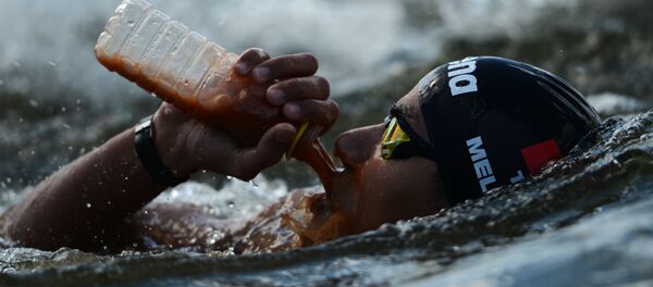 Усама Меллули на дистанции 10 км на открытой воде на ЧМ в Казани Усама Меллули на дистанции 10 км на открытой воде на ЧМ в Казани - Sputnik Узбекистан