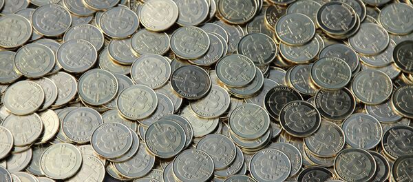 Презентация биткоинов коллекторам Презентация биткоинов коллекторам - Sputnik Узбекистан