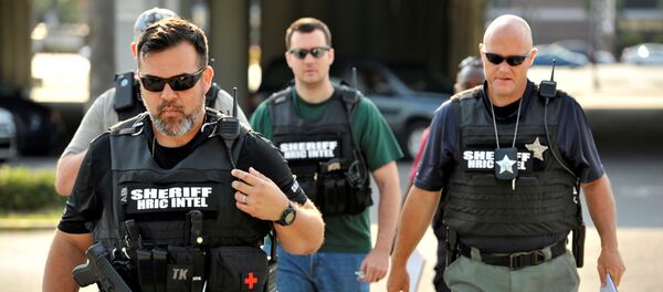 Офицеры полиции в Орландо. Офицеры полиции в Орландо. - Sputnik Узбекистан