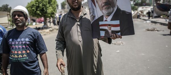 Мисрнинг тахтдан ағдарилган президенти Муҳаммад Мурсий тарафдорлари - Sputnik Ўзбекистон