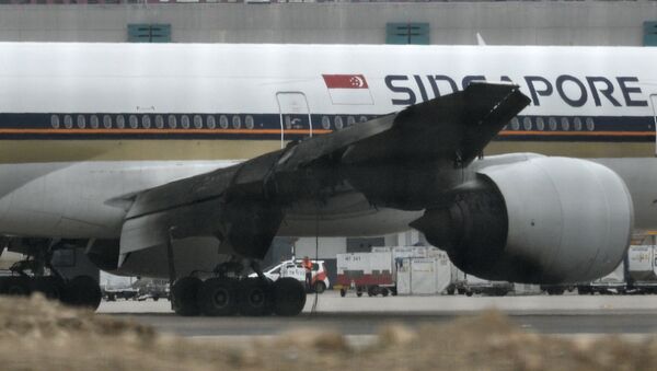 Самолет авиакомпании Singapore Airlines, экстренно севший в Сингапуре - Sputnik Узбекистан
