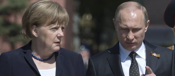 Президент Российской Федерации Владимир Путин и канцлер ФРГ Ангела Меркель - Sputnik Узбекистан