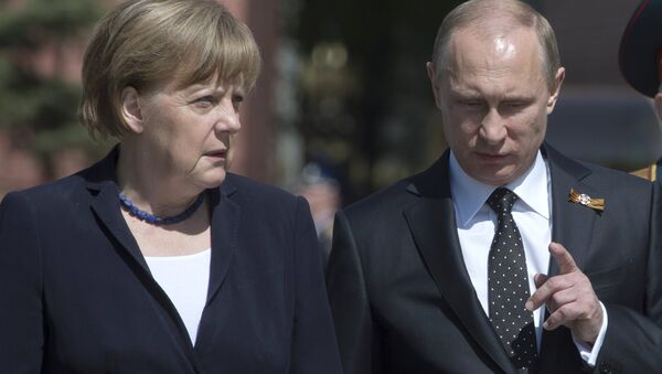 Prezident Rossiyskoy Federatsii Vladimir Putin i kansler FRG Angela Merkel - Sputnik O‘zbekiston