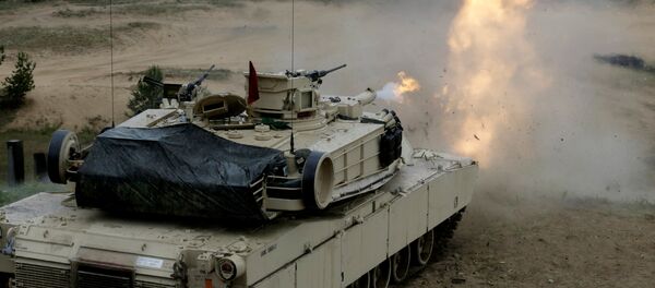 Танк США М1 Абрамс на военных учениях в Адажи Танк США М1 Абрамс на военных учениях в Адажи - Sputnik Ўзбекистон