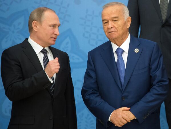 Президент РФ Владимир Путин (слева) и президент Республики Узбекистан Ислам Каримов - Sputnik Узбекистан