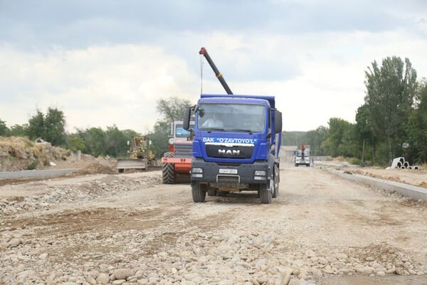 Строительство участка дороги по улице Тараккиет в Ташкенте Строительство участка дороги по улице Тараккиет в Ташкенте - Sputnik Узбекистан