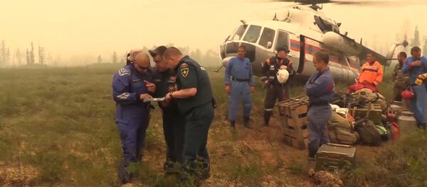 Операция по поиску пропавшего в Иркутской области Ил-76. Съемка МЧС РФ Операция по поиску пропавшего в Иркутской области Ил-76. Съемка МЧС РФ - Sputnik Узбекистан