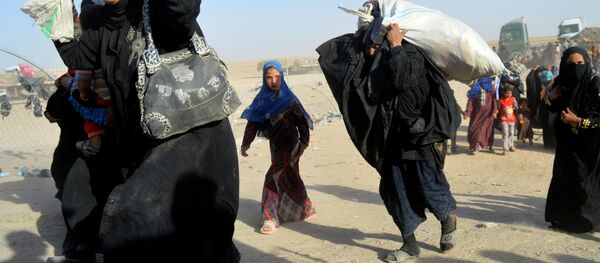 Иракские женщины на базе Рамади в Ираке Иракские женщины на базе Рамади в Ираке - Sputnik Узбекистан