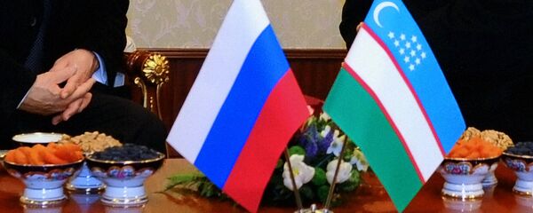Россия ва Ўзбекистон байроқлари Россия ва Ўзбекистон байроқлари - Sputnik Ўзбекистон