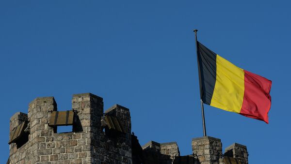 Флаг Бельгии на башне замка графов Фландрии в Генте. Архивное фото - Sputnik Узбекистан