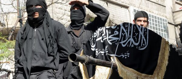 Джабҳат ан-Нусра жангарилари Джабҳат ан-Нусра жангарилари - Sputnik Ўзбекистон