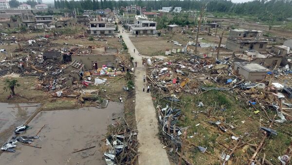 Китай парализован: мощнейший за 30 лет тайфун Нида достиг юга страны - Sputnik Узбекистан