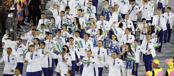 Сборная Узбекистана на церемонии открытия Олимпийских Игр Сборная Узбекистана на церемонии открытия Олимпийских Игр - Sputnik Узбекистан