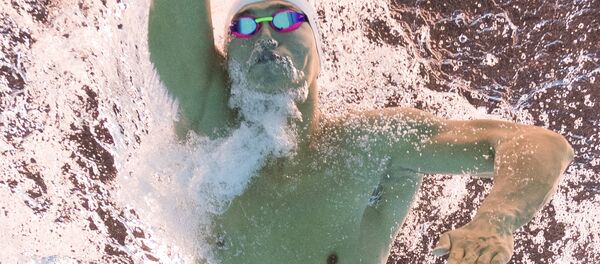 Пловец во время заплыва Пловец во время заплыва - Sputnik Узбекистан