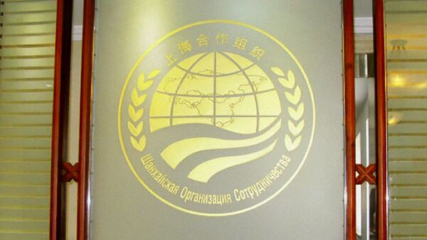 Эмблема Шанхайской организации сотрудничества (ШОС) - Sputnik Ўзбекистон