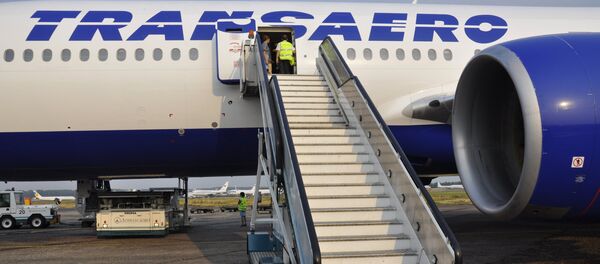 Самолет Боинг-777 авиакомпании Трансаэро Самолет Боинг-777 авиакомпании Трансаэро - Sputnik Узбекистан