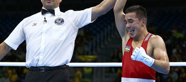 Ўзбек боксчиси Ҳасанбой Дўсматов Ўзбек боксчиси Ҳасанбой Дўсматов - Sputnik Ўзбекистон