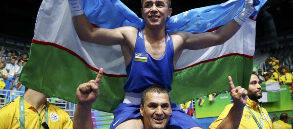 Ўзбек боксчиси Ҳасанбой Дўсматов - Sputnik Ўзбекистон