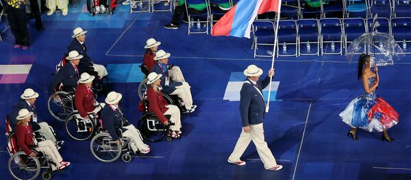 Паралимпийская сборная России на церемонии открытия ХIV летних Паралимпийских игр на Олимпийском стадионе в Лондоне. Паралимпийская сборная России на церемонии открытия ХIV летних Паралимпийских игр на Олимпийском стадионе в Лондоне. - Sputnik Узбекистан